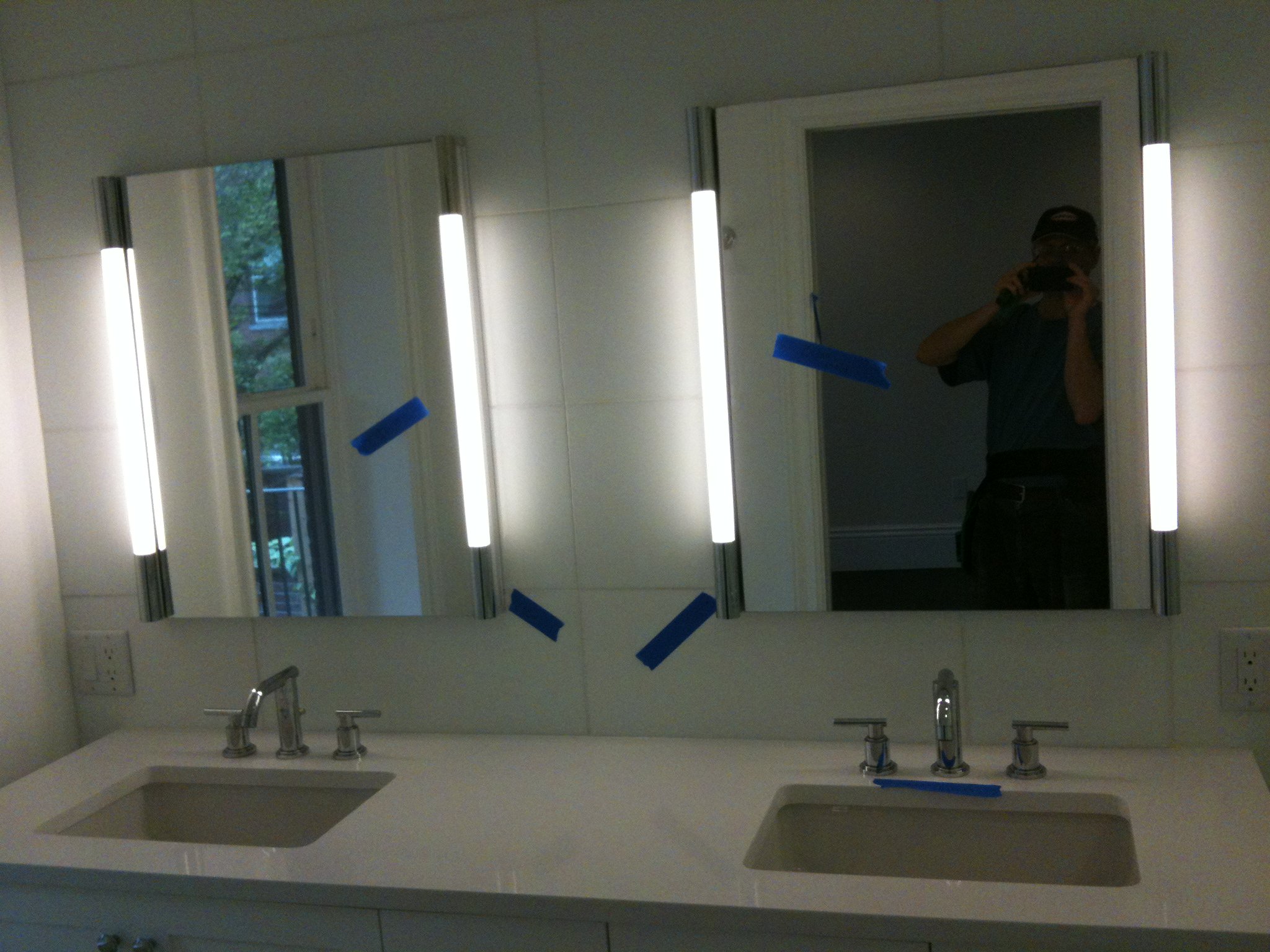 Bathroom vanity sconce installation