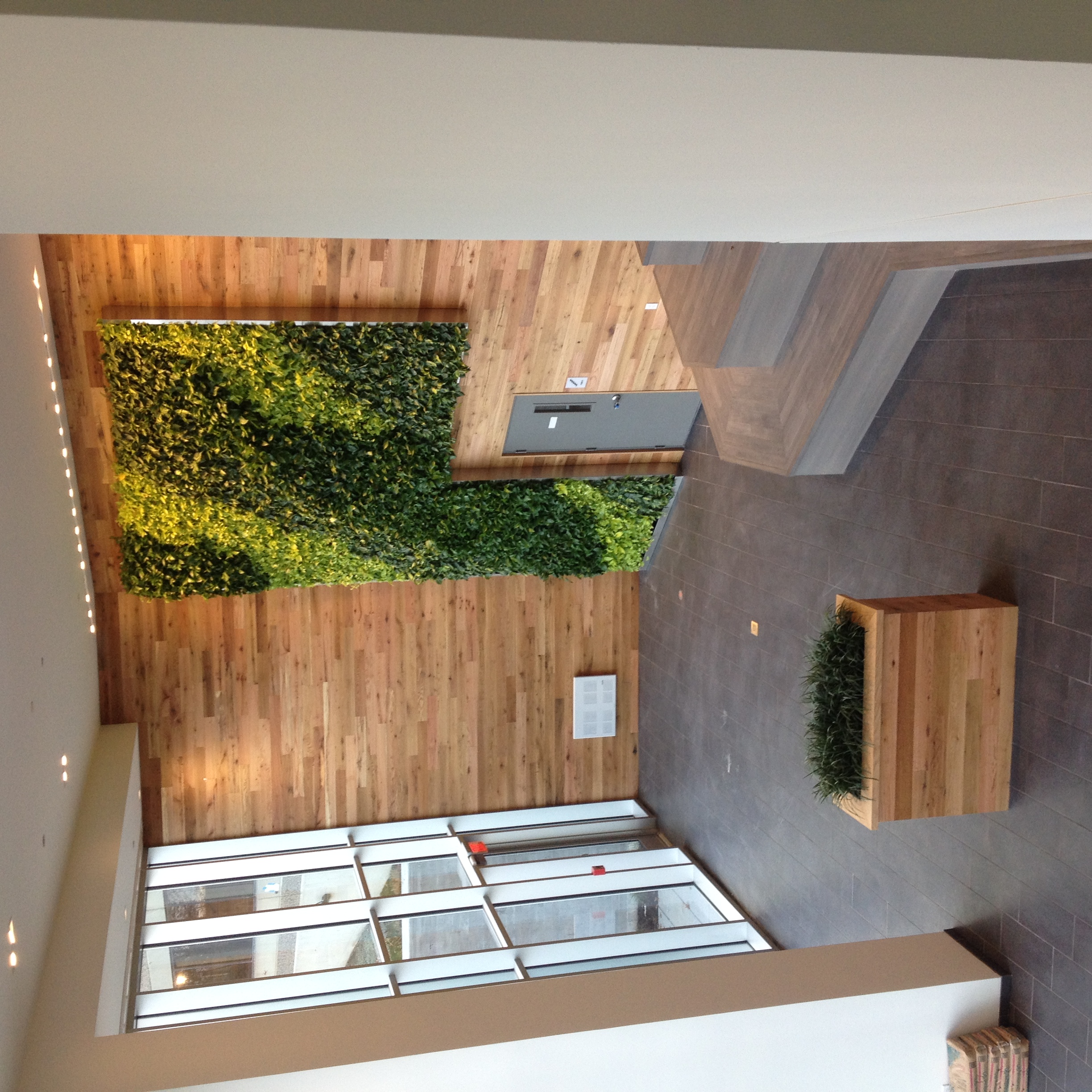 Glass floor light installation in commercial lobby